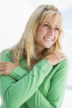 Royalty Free Photo of a Blonde Woman in a Green Sweater