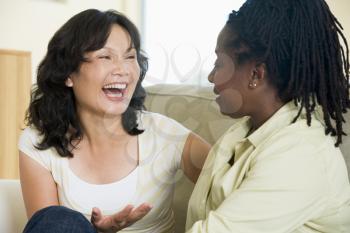 Royalty Free Photo of a Woman Talking to Another Woman