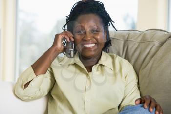 Royalty Free Photo of a Woman Talking on a Telephone