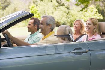 Royalty Free Photo of Two Couples in a Convertible