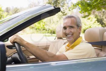 Royalty Free Photo of a Man in a Convertible