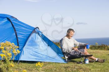 Royalty Free Photo of a Man Camping