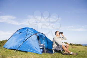 Royalty Free Photo of a Camper With Binoculars