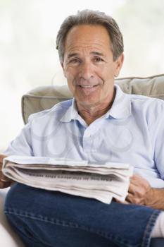 Royalty Free Photo of a Man With a Newspaper