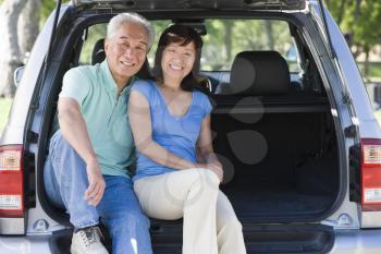 Royalty Free Photo of a Couple in the Back of a Van
