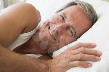Royalty Free Photo of a Man in Bed
