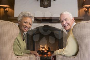 Royalty Free Photo of a Couple By the Fire
