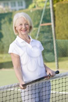 Royalty Free Photo of a Woman With a Tennis Racket