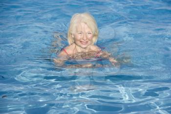 Royalty Free Photo of a Woman Swimming