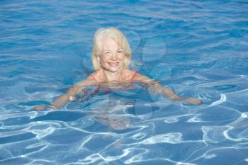Royalty Free Photo of a Woman in a Swimming Pool