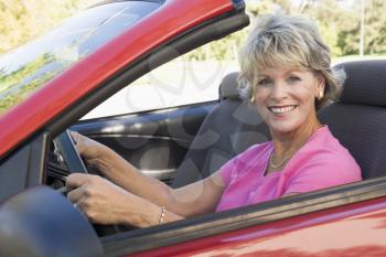 Royalty Free Photo of a Woman in a Convertible