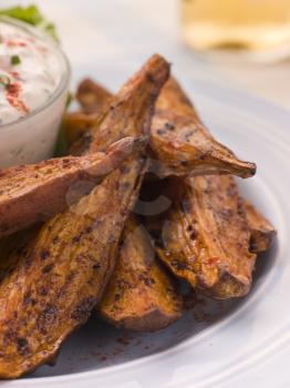 Royalty Free Photo of Sweet Potato Wedges With Dip