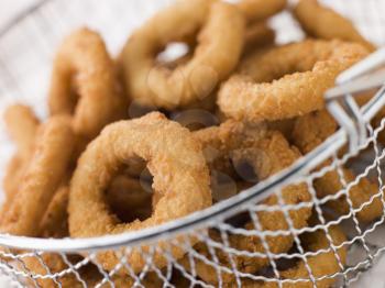 Royalty Free Photo of Onion Rings in a Basket