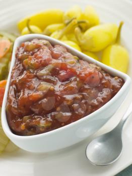 Royalty Free Photo of a Pot of Burger Relish with Pickled Californian Chilies
