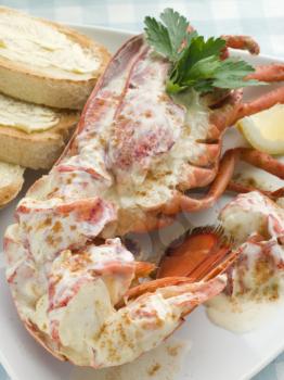 Royalty Free Photo of Lobster Newburg with Toast and Lemon