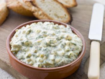 Royalty Free Photo of a Dish of Sauce Gribiche with Toasted Baguette