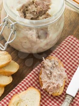 Royalty Free Photo of Rilette of Duck and Pork with Toasted Baguette Croutes