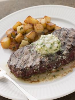 Royalty Free Photo of Entrecote de Beouf' with Roquefort Butter and Parmentier Potatoes