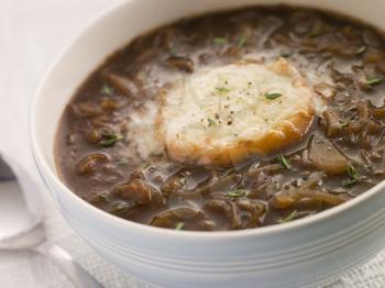 Royalty Free Photo of a Bowl of French Onion Soup With a Goats Cheese Crouton