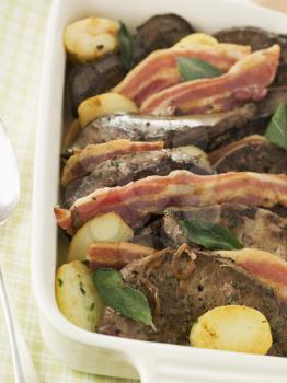 Royalty Free Photo of Calves Liver Bacon and Saute Potatoes