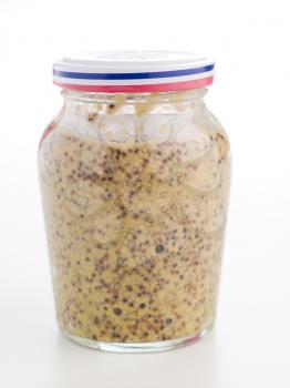 Royalty Free Photo of a Jar of Dijon Grain Mustard