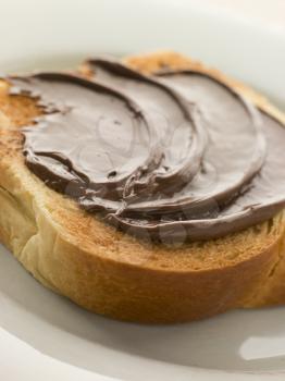 Royalty Free Photo of Slice of Toasted Brioche With Chocolate Spread