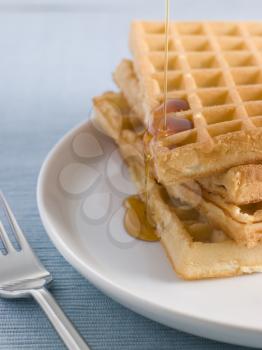 Royalty Free Photo of Waffles with Caramel Syrup