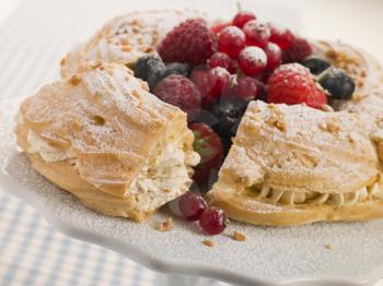 Royalty Free Photo of Paris Brest With Mixed Berries and Hazelnuts