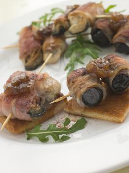 Royalty Free Photo of Angels and Devils on Horseback on Toasts