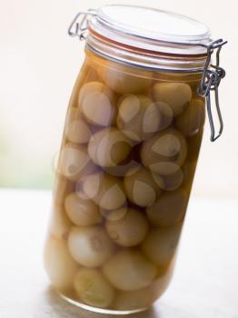 Royalty Free Photo of Onions Pickling in a Kilner Jar