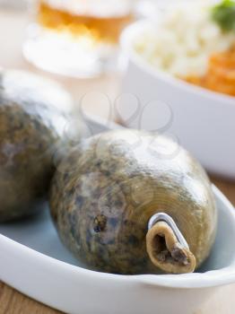 Royalty Free Photo of Whole Haggis With Neeps Tatties and Whiskey