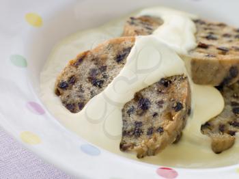 Royalty Free Photo of Bowl of Spotted Dick with Custard