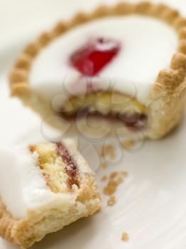 Royalty Free Photo of a Cherry Bakewell Tart