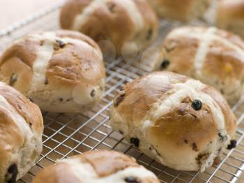 Royalty Free Photo of Hot Cross Buns on a Cooling Rack