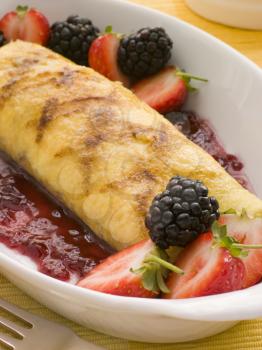 Royalty Free Photo of a Jam Omelette with Berries