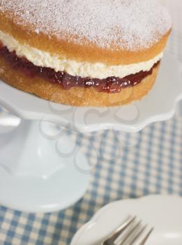 Royalty Free Photo of a Victoria Sponge on a Cake Stand