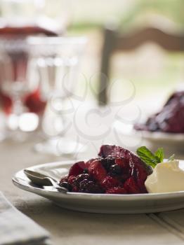Royalty Free Photo of Summer Pudding with Clotted Cream