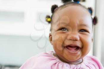 Royalty Free Photo of a Baby Laughing