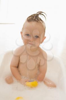 Royalty Free Photo of a Baby in a Bubble Buth