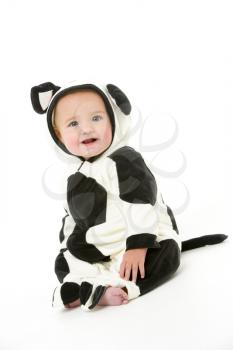 Royalty Free Photo of a Baby in a Cow Costume