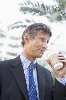 Royalty Free Photo of a Man Drinking Coffee