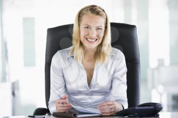 Royalty Free Photo of a Woman at a Desk