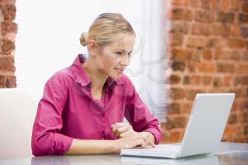 Royalty Free Photo of a Woman at a Laptop