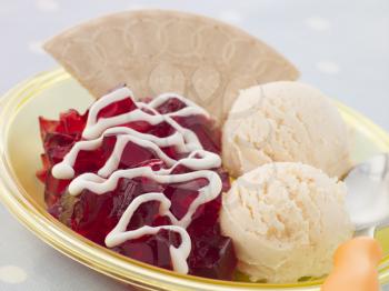 Royalty Free Photo of Jelly and Ice Cream with a Wafer and Cream