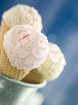 Royalty Free Photo of a Trio Of Ice Creams in Wafer Cones
