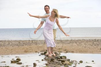 Royalty Free Photo of a Couple on the Beach