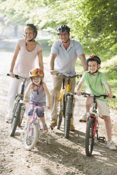 Royalty Free Photo of a Family on Bikes