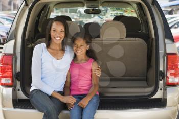 Royalty Free Photo of a Woman in a Hatchback With a Girl
