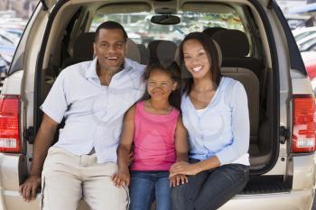 Royalty Free Photo of a Family in a Van