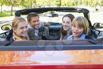 Royalty Free Photo of a Family in a Convertible